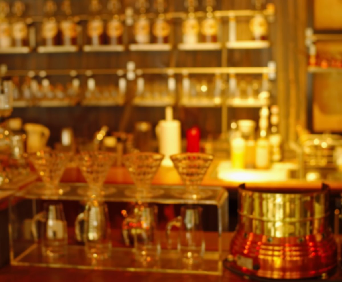 A vintage cafe counter, softly blurred — warm, characterful and inviting